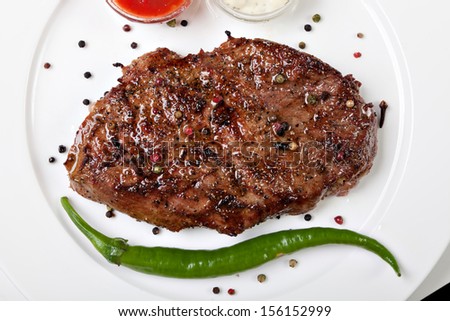 pepper steak on a white plate