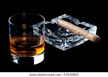 glass of whisky and cigar