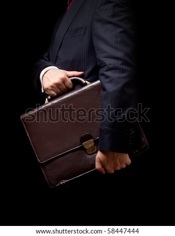 person holding suitcase