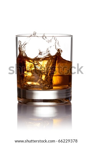 Whiskey splash. Isolated on white background, with clipping path