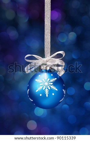 christmas balls on a holiday lights background