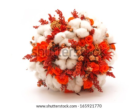 Preserved flowers and cotton wedding bouquet on white background