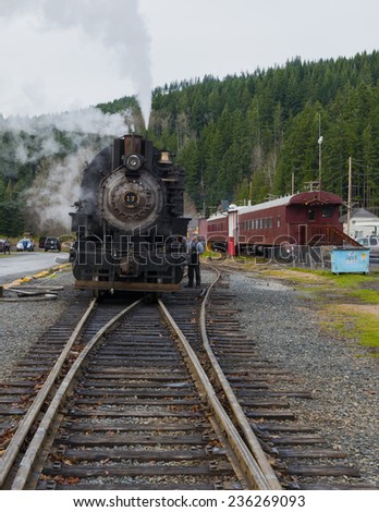 Mt Rainier Scenic Ride. December, 7 2014. Elbe, WA. Railroad in Elbe offers a 2-hour steam train excursions through the forest and foothills of Mt Rainier.