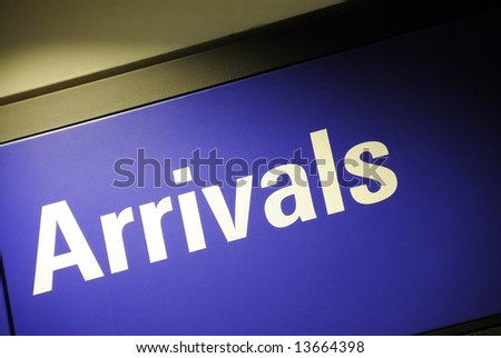 stock photo : Arrivals sign at the airport terminal