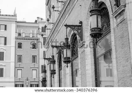 Roma, Italy - October 2015: Street vintage retro lights for illumination in the bank building in Rome Piazza Venezia