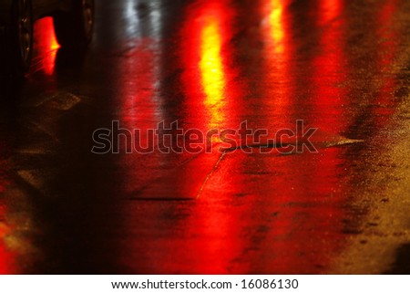 a road arrow taken after the rain