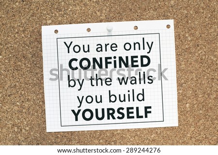 Motivational Quote Phrase Note on Cork Bulletin Board / You are only confined by the walls you build yourself