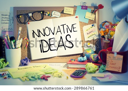 Innovative Ideas / Business innovation concept in messy office interior