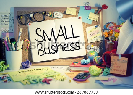 Small Business / Small business concept on bulletin board in office