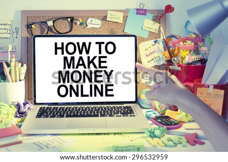 How to make money online / Making money internet concept note on laptop