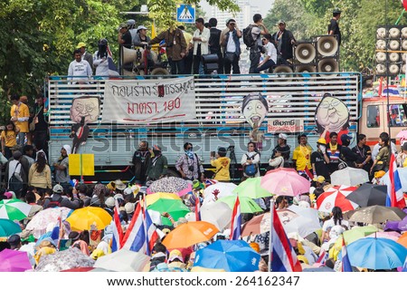 BANGKOK-December 9 : The Thai people protest against the government of Yingluck Shinawatra on the road around Government House  on December 9, 2013 in Bangkok, Thailand.