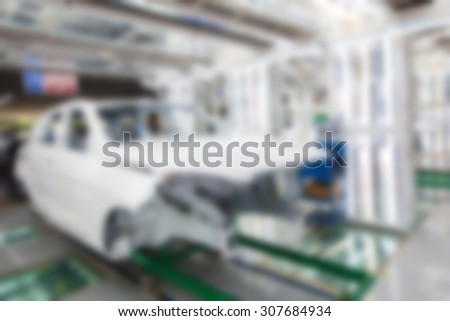 blurry background of paint room for car in car factory