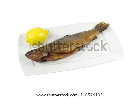 one smoked rainbow trout on white plate