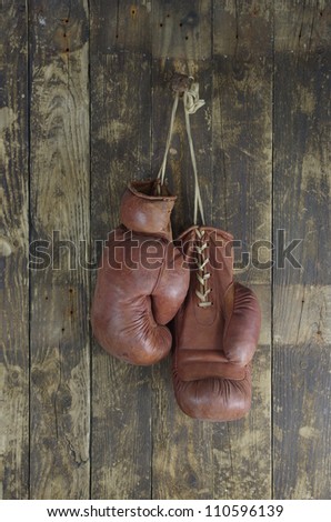 old boxing pendant on peg gloves