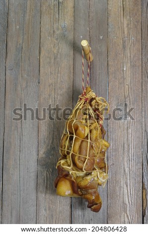 smoked pork fat on wood background