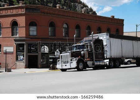 OURAY, CO, USA - JUNE 5: A truck on Main street on June 5, 2013 in Ouray, CO, USA. Ouray was a mining town in the 19th century but relies now on tourism and is called the Switzerland of America.