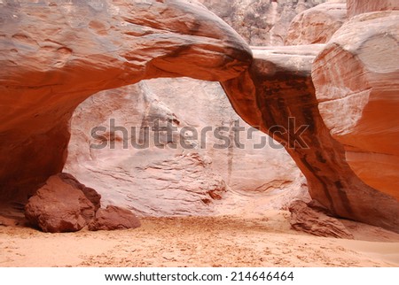 Sand dune arch in Arches National Park, Utah, USA. Broken Arch is one of the more than 2000 natural stone arches located close to Moab.