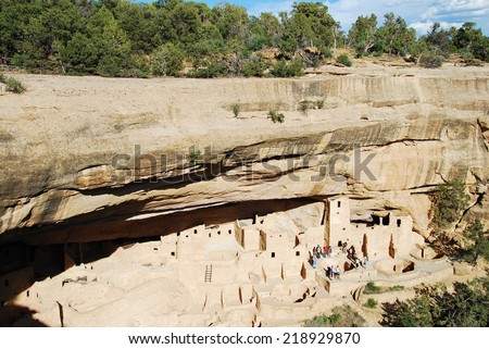 A ranger-guided tour in the ruins of Cliff Palace in Mesa Verde National Park, CO, USA. Mesa Verde was inhabited by the Ancestral Pueblo people from AD 600 to 1300.