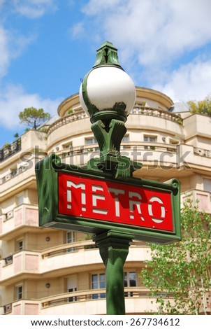 PARIS - MAY 11, 2013: A sign at a subway station entrance in Paris. Paris metro is 214 kilometers long and has 303 stations.