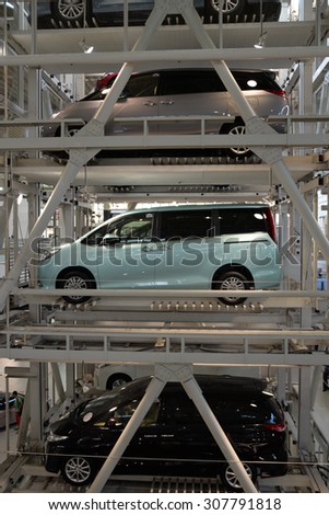 TOKYO - JULY 31, 2015: an automated multi-story car parking system. Automatic multi-story car park systems enable to optimize space in crowded cities.