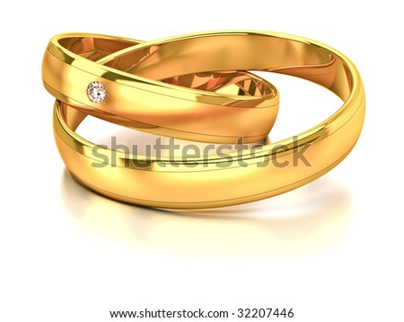 stock photo Two wedding rings with matt and glossy gold and diamond