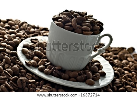 A cup full of coffee seeds