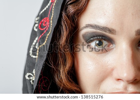 shot of part of muslim woman\'s face - eye with long eyelashes. Sexy looking eye look