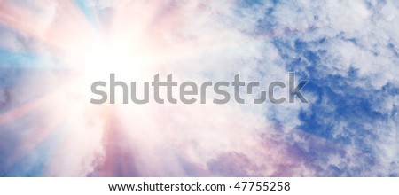 light clouds in the blue sky and pink star