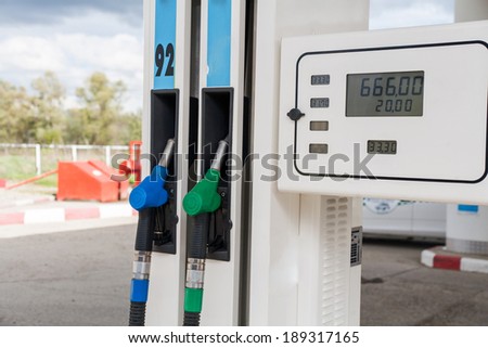 Petrol-station. Two gas pumps of green and blue colors