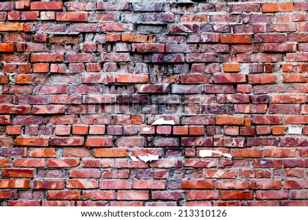 Old grunge brick wall background. Old red brick wall texture.