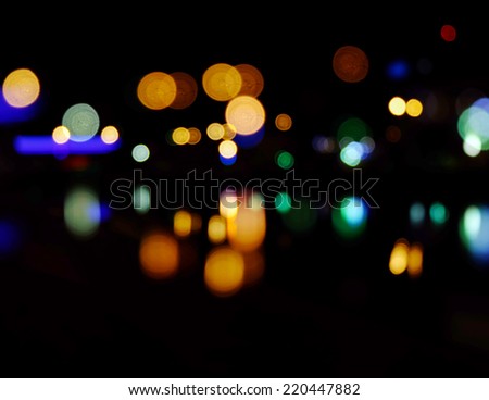 Blurred city at night background. Night city street lights bokeh wallpaper. Street lights