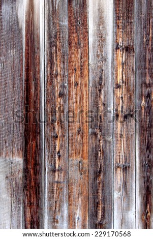 Weathered wood planks. Cracked old desk. Textured wall background. Grunge dirty wooden texture. Vintage retro backdrop. Rough hardwood plank. Abstract nature pattern. Brown dark grain surface.