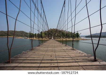 rope bridge to the island in the bug dam Thailand