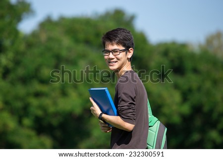 asian student in the park with book and lecture note Bangkok Thailand
