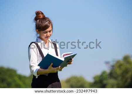 group of asian student in the park with book and lecture note Bangkok Thailand