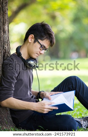 Asian student in park of Bangkok Thailand