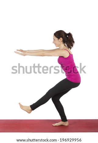 Fitness woman doing squat with leg lift