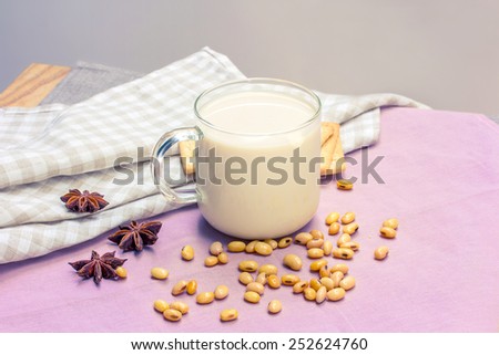 Soy milk with soy bean and cracker in vintage color tone