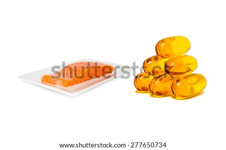 Fish oil supplement product capsules with salmon on dish isolated on white background