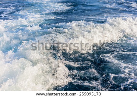 Speed boat wake in the sea. This is the view behind a speed boat.