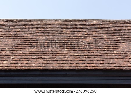 old style roof top tile made of clay