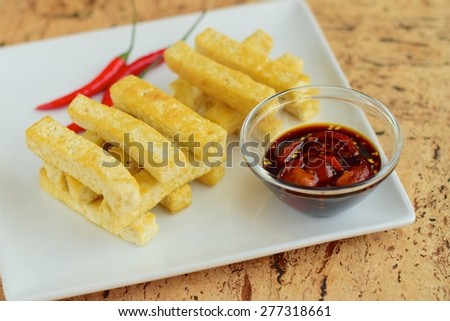 Fried Tofu Sticks with Thick Soy Sauce Chili Tomato Dip