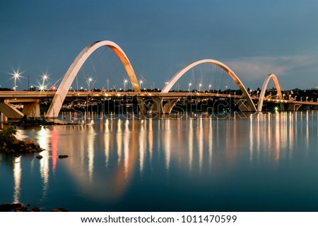 When the night comes the lights appear to illuminate the city. Night view of JK bridge. Sky of Brasilia, capital of Brazil.