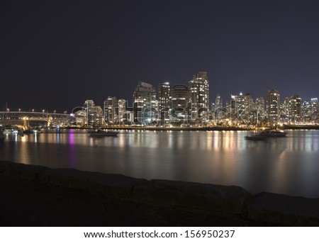 Vancouver Skyline and Sailboats in False Creek Harbour, Vancouver, British Columbia, Canada.