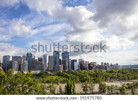 CALGARY, ALBERTA, CANADA - JUNE 20, 2013: The Bow River floods in Downtown Calgary Alberta in the costliest disaster in Canadian History.