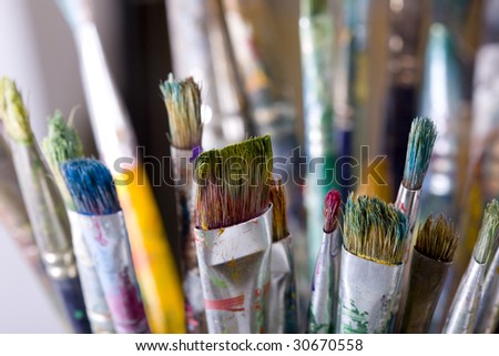 Painting brushes in artist studio