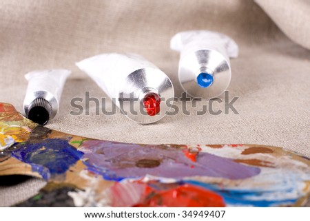 Paint tubes on linen canvas