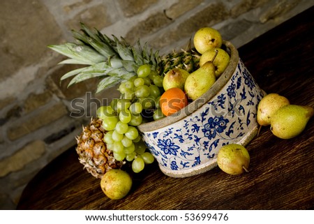 Traditional basket full of fruits - still life shoot