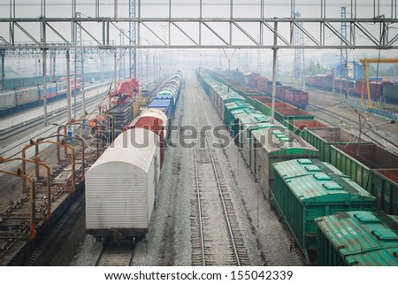 Railway switchyard. freight cars waiting for departure. fog.