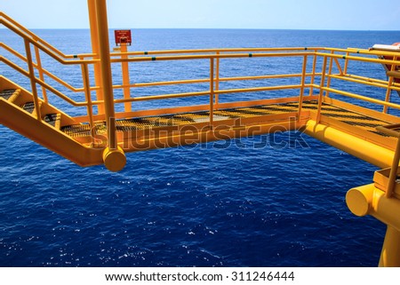 Walkway offshore Industry oil and gas production petroleum pipeline.
